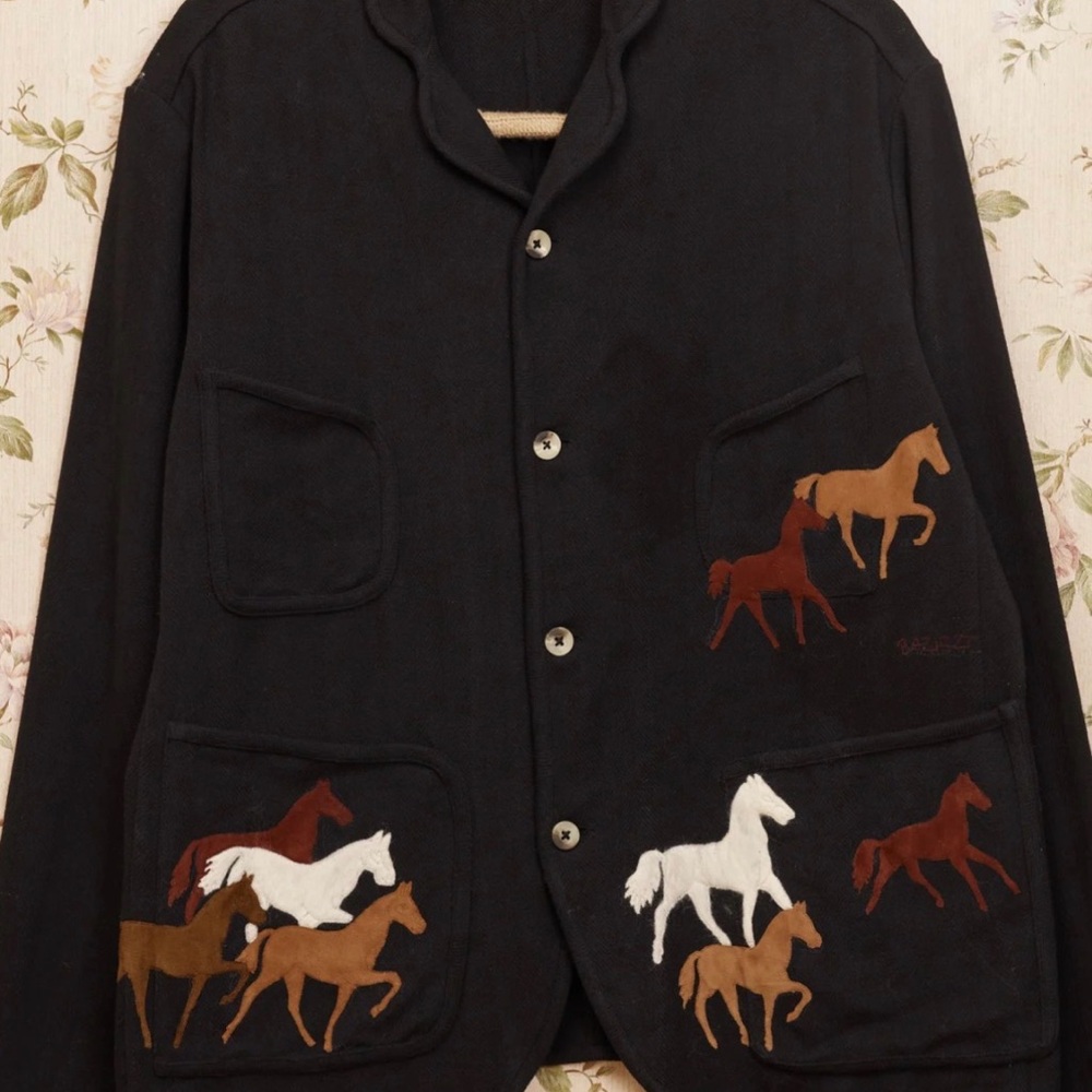 I am looking to buy this jacket in size small gently used or new